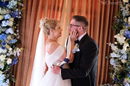 Bride and groom during ceremony at the King Arthur Hotel Gower